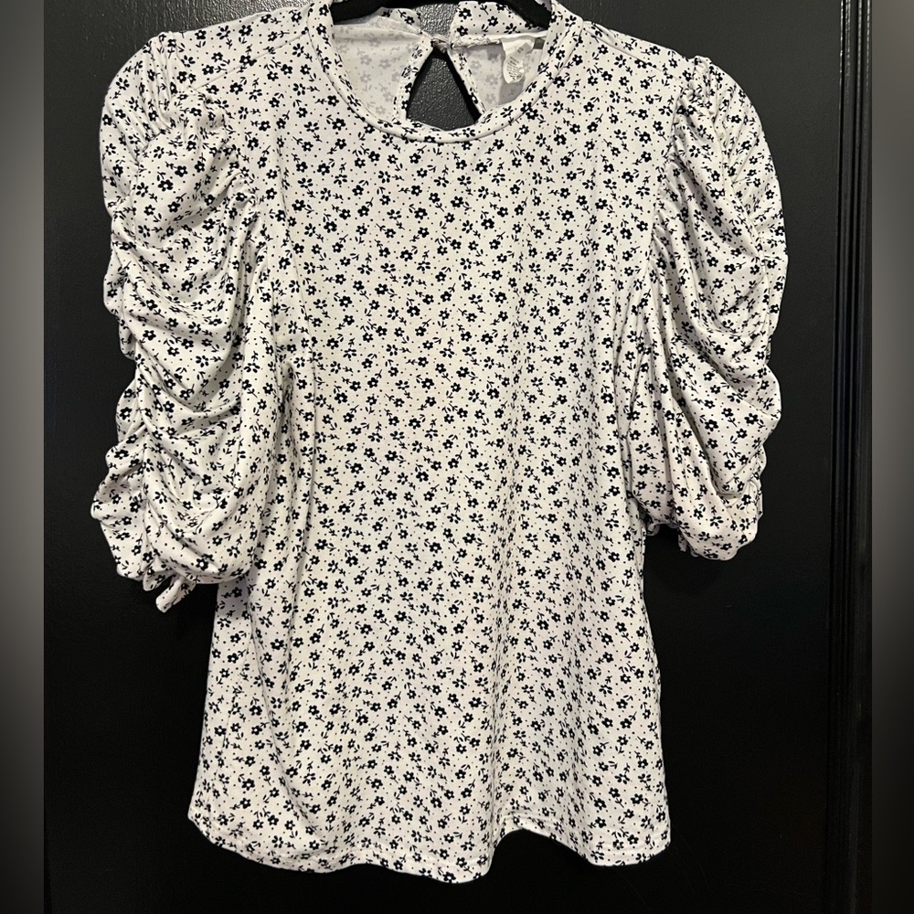 Black and white floral top with puffed sleeves